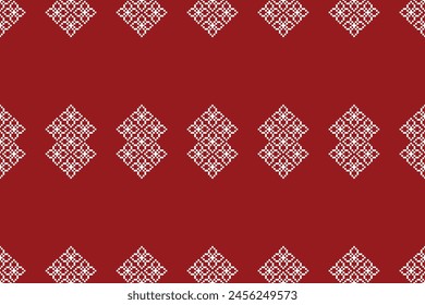 Traditional ethnic motifs ikat geometric fabric pattern cross stitch.Ikat embroidery Ethnic oriental Pixel red background. Abstract,vector,illustration. Texture,christmas,decoration,wallpaper.