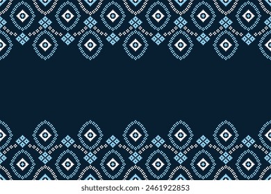 Traditional ethnic motifs ikat geometric fabric pattern cross stitch.Ikat embroidery Ethnic oriental Pixel navy blue background. Abstract,vector,illustration. Texture,decoration,wallpaper.