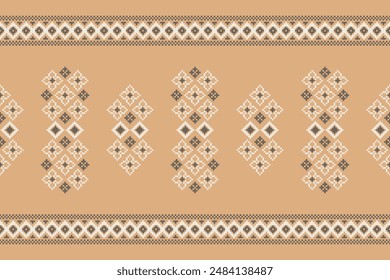 Traditional ethnic motifs ikat geometric fabric pattern cross stitch.Ikat embroidery Ethnic oriental Pixel brown cream label background. Abstract,vector,illustration. Texture,decoration,wallpaper.