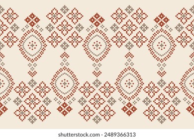 Traditional ethnic motifs ikat geometric fabric pattern cross stitch.Ikat embroidery Ethnic oriental Pixel brown cream label background. Abstract,vector,illustration. Texture,decoration,wallpaper.