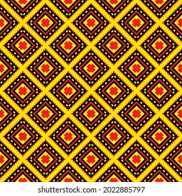 Traditional fabric patterns in yellow, black and red tones are placed as a pattern.