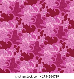 Traditional floral pattern batik drawing with dots and curly lines in pink tones. Batik is an Indonesian technique of wax-resist dyeing applied to whole cloth.