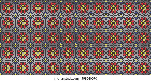 Traditional folk art knitted embroidery pattern on silver metal background
