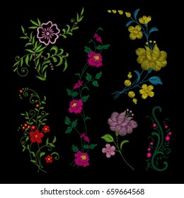 Traditional folk flower fashionable embroidery on the black background. A bouquet of roses and a dog rose, for printing on clothes, vector