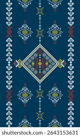 Traditional geometric embroidery pattern with diamond shapes and intricate motifs in red, yellow, and white on a dark blue background.