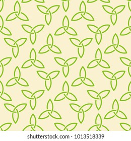 Traditional green celtic style braided knots triquetra symbols seamless pattern. Irish St. Patrick's day vector backround.
