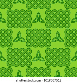Traditional green celtic style braided knots seamless pattern. Irish St. Patrick's day vector backround illustration.