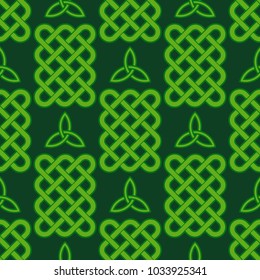 Traditional green celtic style braided knots seamless pattern. Irish St. Patrick's day vector backround illustration.