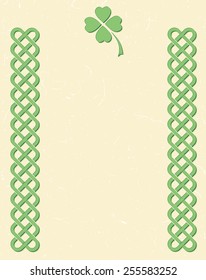 Traditional green celtic style braided knot borders with shamrock leaf over textured vintage background, room for text.