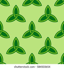 Traditional green celtic style braided knots triquetra symbols seamless pattern. Irish St. Patrick's day vector background.