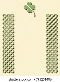 Traditional green celtic style braided knot borders with shamrock leaf over textured vintage background, room for text.