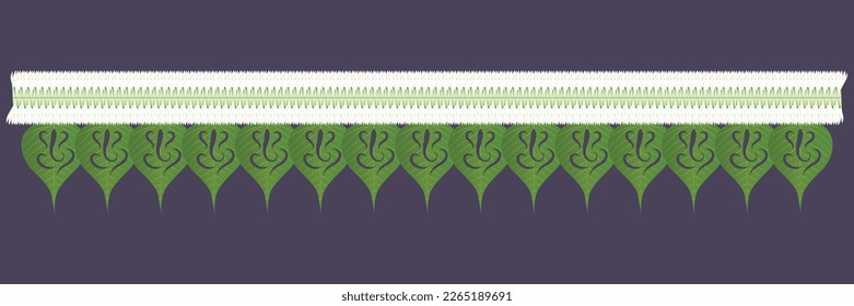 Traditional Indian floral garland with Mexican Tuberose (sampangi) flowers and peepal leaves. Decoration for Indian hindu events holidays and ganesh chaturthi. leaf cut ganpati wreath.