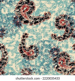 Traditional indian paisley pattern on grunge background.