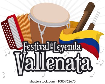 Traditional instruments for Vallenato Legend Festival (written in Spanish): accordion, caja vallenata drum, guacharaca, fork behind Colombian flag for this musical celebration.