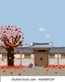 Traditional Korean style house and the red maple tree in autumn. Suitable for national holiday background.
