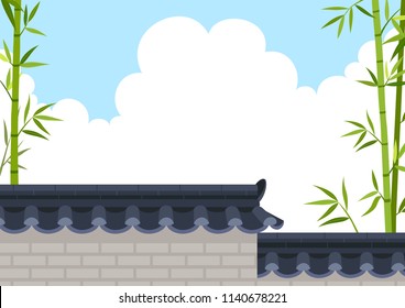 Traditional Korean style stone wall fence with bamboo on sky background