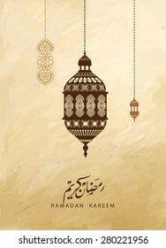 traditional lantern of Ramadan- Ramadan Kareem beautiful greeting card with arabic calligraphy which means ''Ramadan kareem '' .