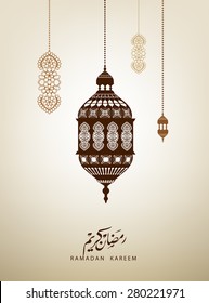 traditional lantern of Ramadan- Ramadan Kareem beautiful greeting card with arabic calligraphy which means ''Ramadan kareem '' .