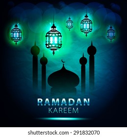 traditional lantern of Ramadan- Ramadan Kareem beautiful greeting card with arabic calligraphy which means Ramadan kareem 