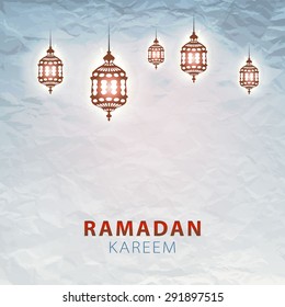 traditional lantern of Ramadan- Ramadan Kareem beautiful greeting card with arabic calligraphy which means Ramadan kareem 