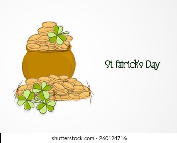 Traditional mud pot full of golden coins with shamrock leaves for Happy St. Patrick's Day celebration