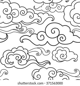 Traditional oriental ornament in black & white. Clouds on the sky. Vector seamless pattern