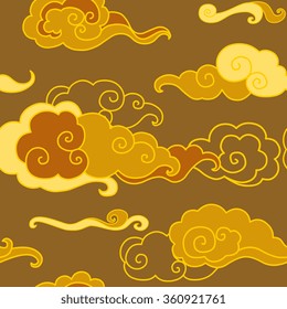 Traditional oriental ornament in golden tones. Clouds on the sky. Vector seamless pattern