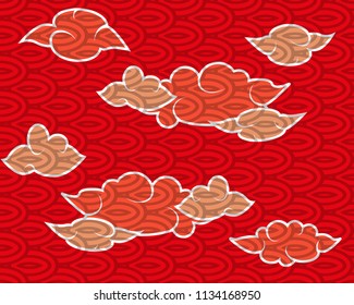 Traditional oriental pattern of clouds on  bright red background. Vector drawing.