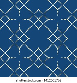 Traditional pointillism seamless pattern. geometrical pattern structured by many dots with vintage color.