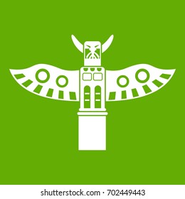 Traditional religious totem pole icon white isolated on green background. Vector illustration