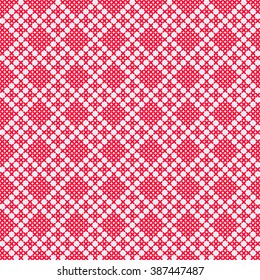 Traditional russian ornament in red and white colors. Vector cross stitch pattern, seamless embroidery pattern. Decorative cross stitch needlework design.