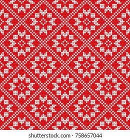 Traditional scandinavian pattern. Nordic ethnic seamless knitted background. Textures in red and white colors. Vector illustration. Can use for warm clothes design, Christmas and new year background