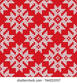Traditional scandinavian pattern. Nordic ethnic seamless knitted background. Textures in red and white colors. Vector illustration. Can use for warm clothes design, Christmas and new year background