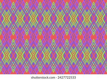 Traditional seamless pattern design of ethnic geometric for background with purple, red and green colors.