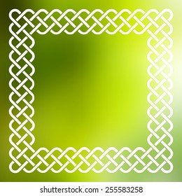 Traditional style braided knot celtic frame over square abstract smooth blur green background.