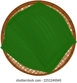 Traditional Thai Threshing basket with Banana Leaf. Kitchenware, Hand weaving circular trays made from the bamboo strip. Bamboo basket weave and banana leaf cut out, empty basket weave bamboo