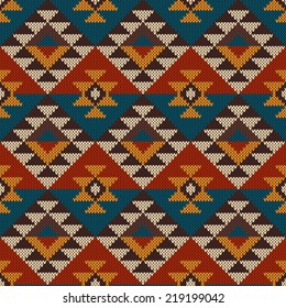 Traditional Tribal Aztec seamless pattern on the wool knitted texture