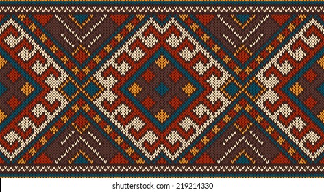 Traditional Tribal Aztec seamless pattern on the wool knitted texture. 