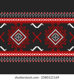 Traditional Ukrainian cross-stitch pattern with pixelated floral and geometric designs, predominantly in red and black. Characteristic of Ukrainian folk art, embroidery for clothing and home decor.