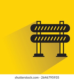 traffic barrier with shadow on yellow background