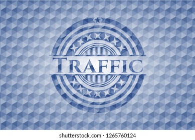 Traffic blue emblem with geometric background.