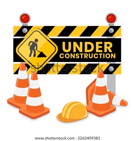 Traffic cones and under construction warning sign. Road safety and prevention of accidents during road construction.