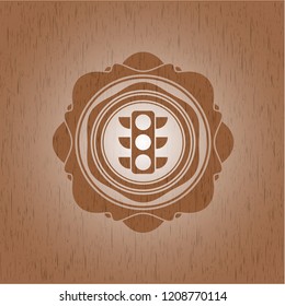 traffic light icon inside badge with wooden background