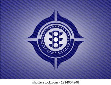 traffic light icon inside badge with denim texture