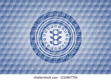 traffic light icon inside blue polygonal emblem.