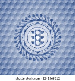traffic light icon inside blue emblem with geometric background.