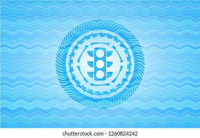 traffic light icon inside light blue water style badge.