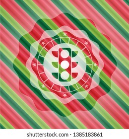 traffic light icon inside christmas emblem.