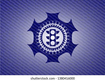 traffic light icon inside emblem with denim texture