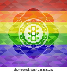 icono del semáforo dentro del emblema sobre fondo de mosaico con los colores de la bandera LGBT